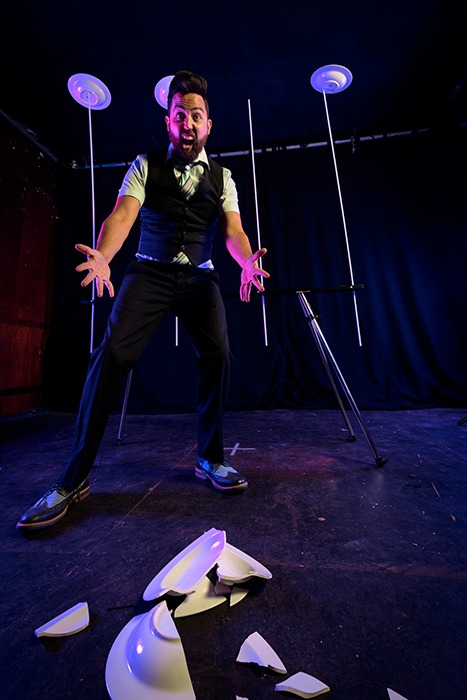 an image of Marky Jay somewhat successfully spinning plates.